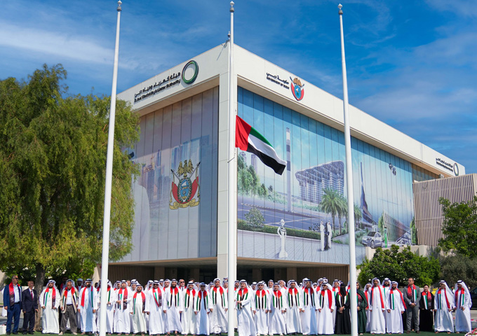 DEWA employees renew their pledge of loyalty and dedication to the UAE and its wise leadership on Flag Day